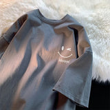 Oversized T-shirt med smil