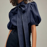 Denim-inspireret skjorte med sløjfe