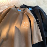 Oversized T-shirt med smil